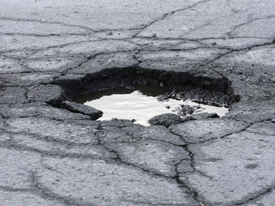 pothole Potholes Pack a Powerful Punch